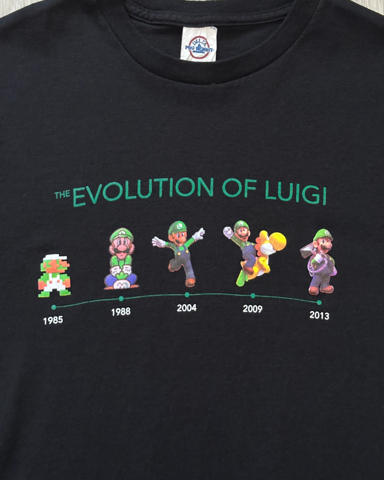 Nintendo Evolution of Luigi T-Shirt - Size M