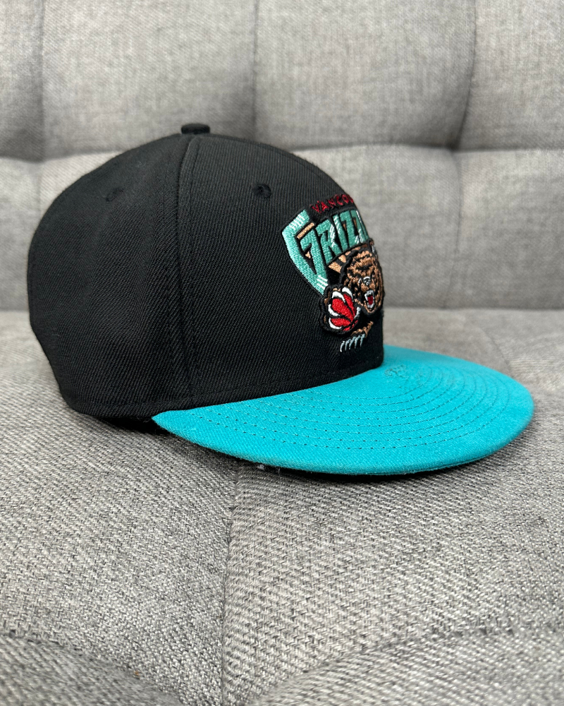 
                  
                    New Era Vancouver Grizzlies NBA Hardwood Classic Fitted Hat - Size 7 1/4
                  
                