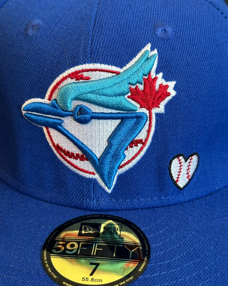 
                  
                    New - New Era 59Fifty Toronto Blue Jays MLB Love & Hustle = Game Fitted Hat - Size 7
                  
                