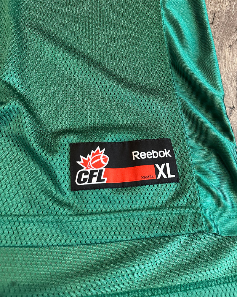 
                  
                    Vintage Reebok Saskatchewan Rough Riders CFL Blank Jersey - Size XL
                  
                