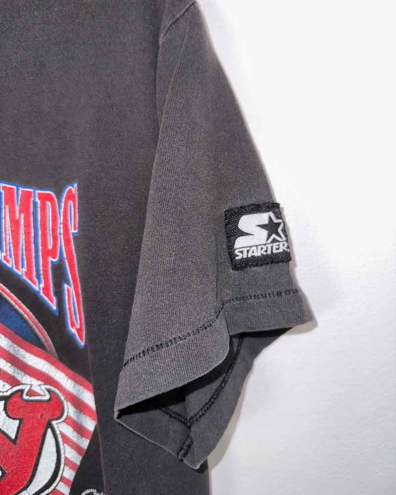 
                  
                    Vintage Starter '95 Stanley Cup Champions New Jersey Devils NHL T-Shirt - Size S
                  
                