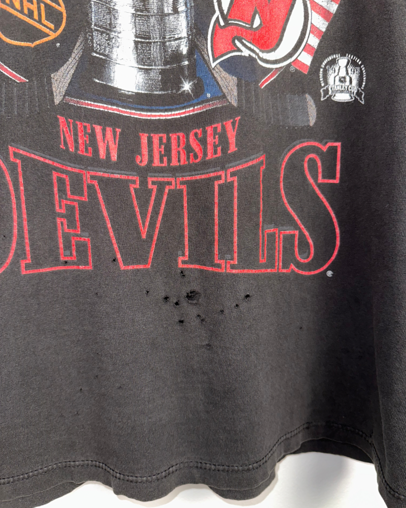 
                  
                    Vintage Starter '95 Stanley Cup Champions New Jersey Devils NHL T-Shirt - Size S
                  
                