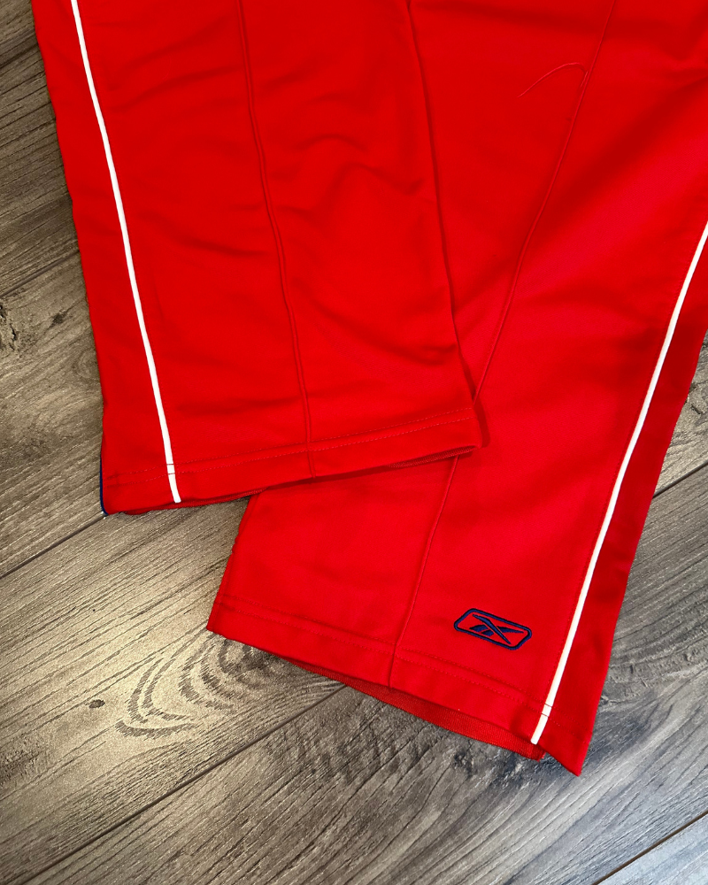 
                  
                    Vintage Reebok Pleated Track Pants - Size L
                  
                