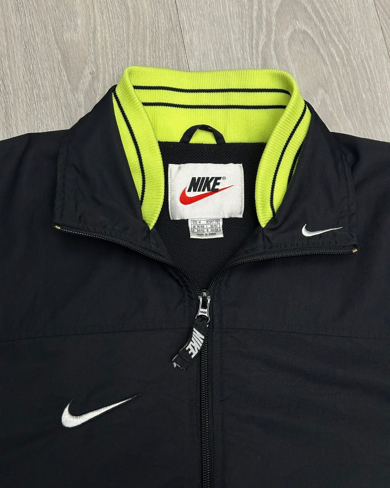 
                  
                    Vintage 90's Nike Windbreaker Jacket - Size M
                  
                