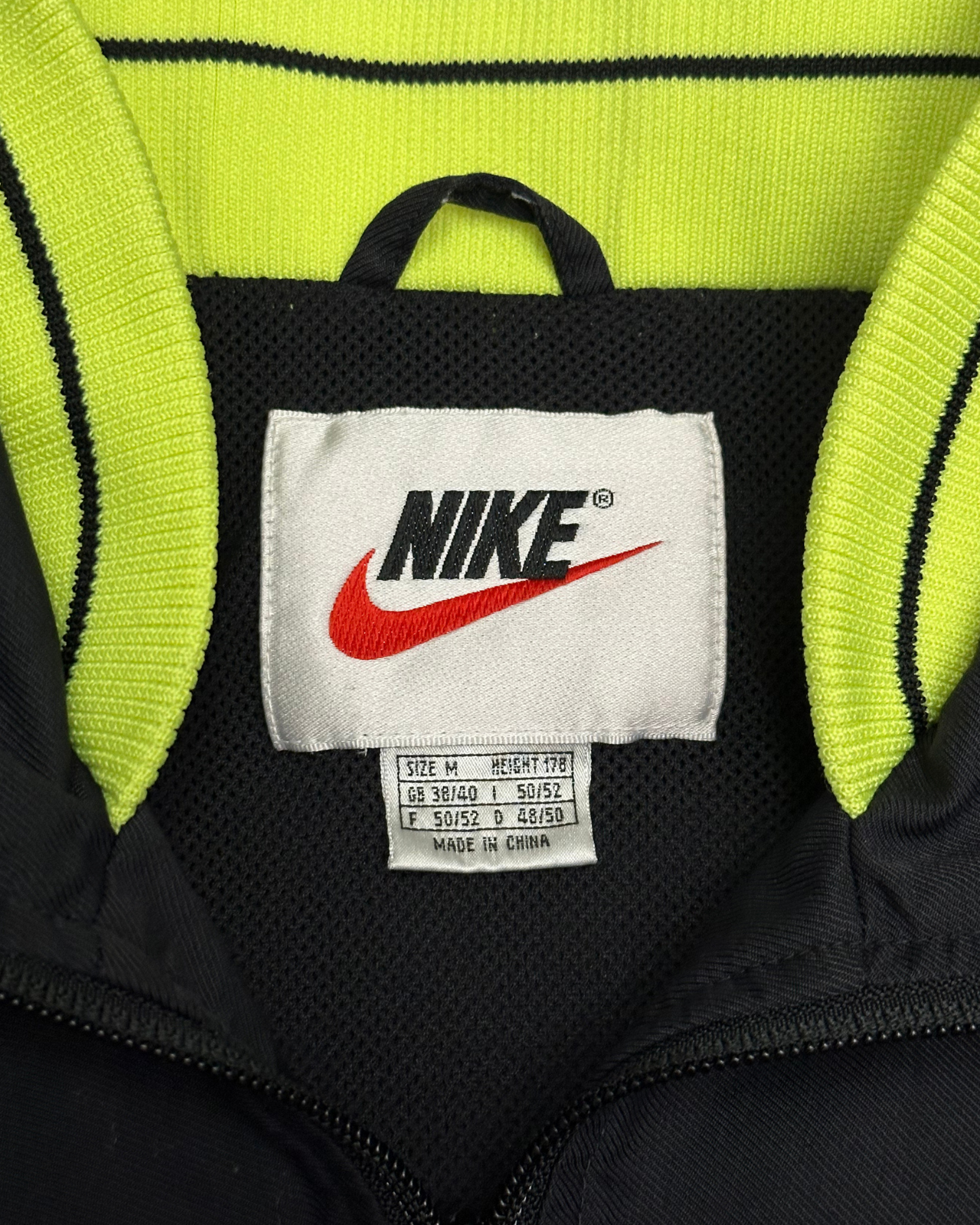 
                  
                    Vintage 90's Nike Windbreaker Jacket - Size M
                  
                