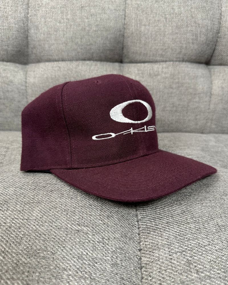 
                  
                    New - Vintage Oakley Logo Maroon Snap Back Hat
                  
                