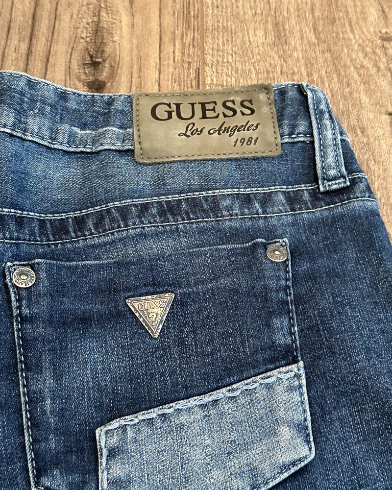 
                  
                    Vintage Guess Women's Patchwork Jean Shorts - Size 27
                  
                