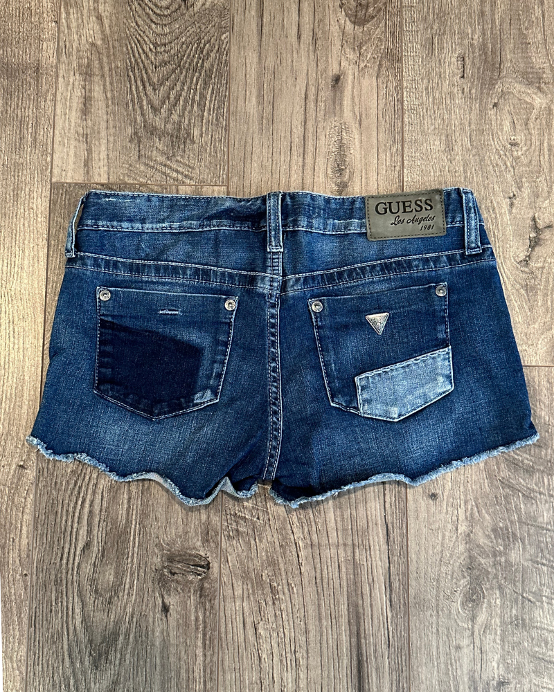 
                  
                    Vintage Guess Women's Patchwork Jean Shorts - Size 27
                  
                