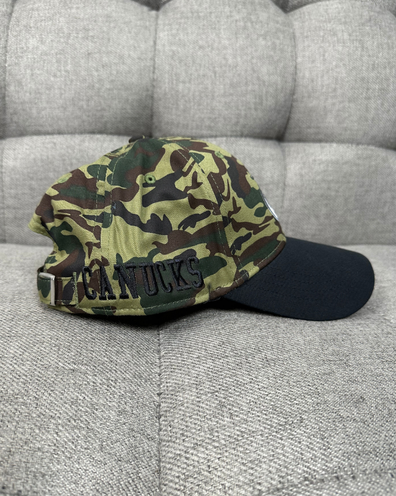 
                  
                    New - Vancouver Canucks NHL Camo Strap Back Cap Hat
                  
                