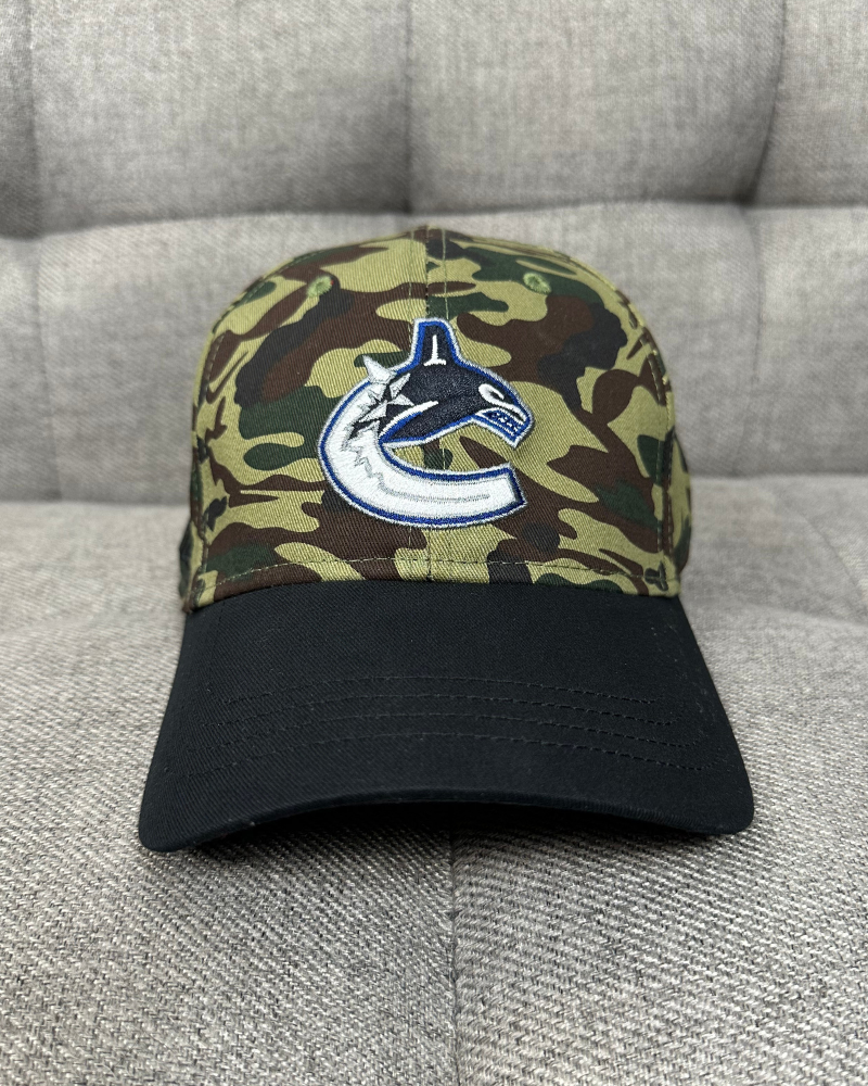 
                  
                    New - Vancouver Canucks NHL Camo Strap Back Cap Hat
                  
                