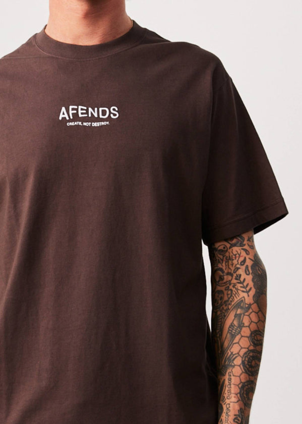 
                  
                    BNWT - Afends Spaced Recycled Retro T-Shirt / Coffee
                  
                